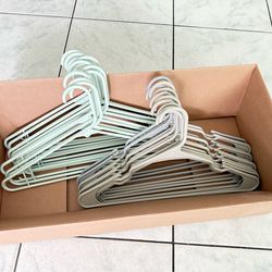 24 White Plastic Clothes Hangers - Like New