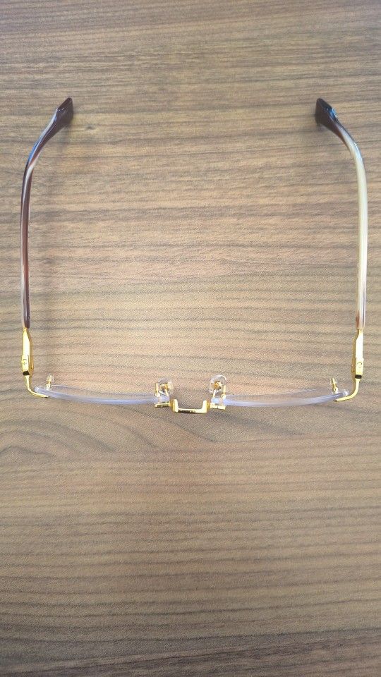 AUTHENTIC GUCCI GOLD RIMLESS FRAMES GG12210