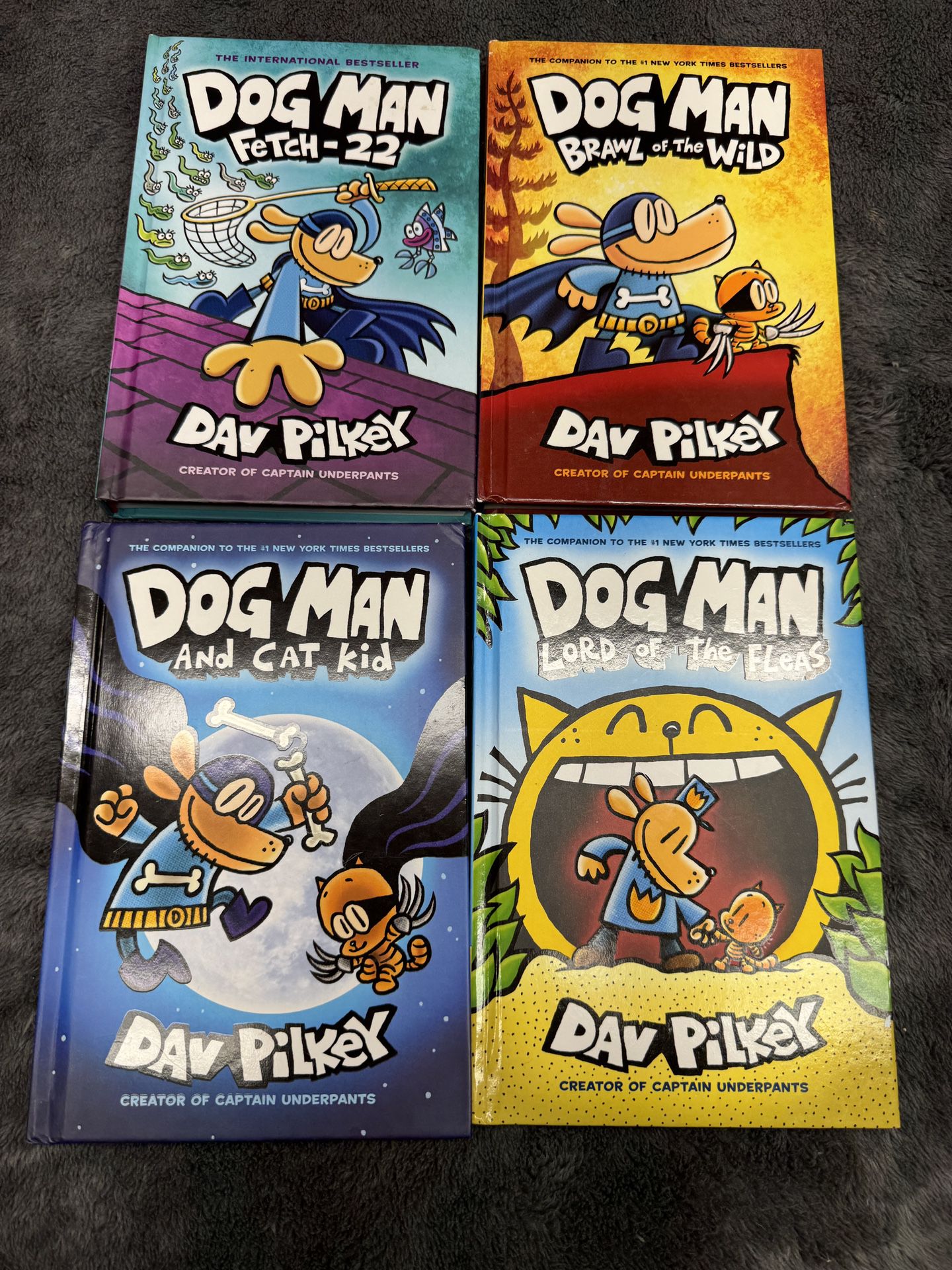 Bundle of 4 Dog Man Hardback Books in great shape!  