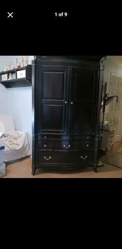 Large,  dark wood Armoire