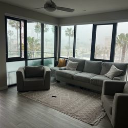 COZY grey goose down couch and 2 gliders