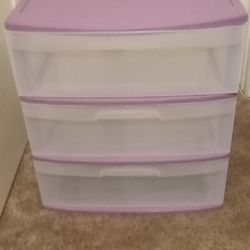 Hard plastic utility box.
22 inches wide 24  inches high