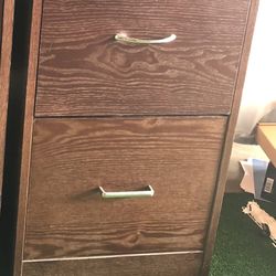 1 New wood filing cabinets Unused, with lock and key  for only $25 