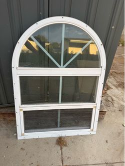 Arched window 23” wide x 32” high