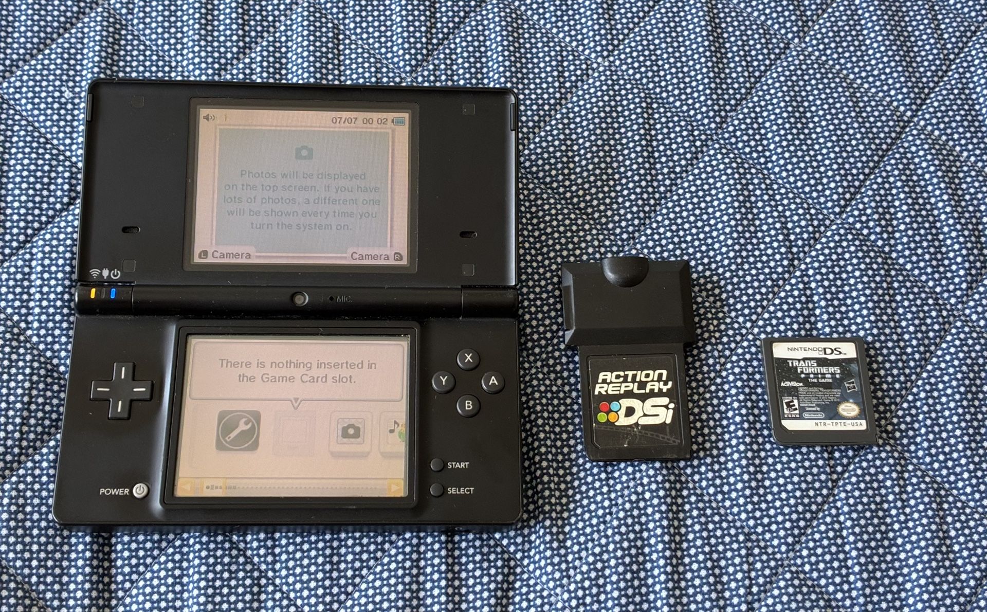 Nintendo Dsi With Charger Action Replay And Transformers Game