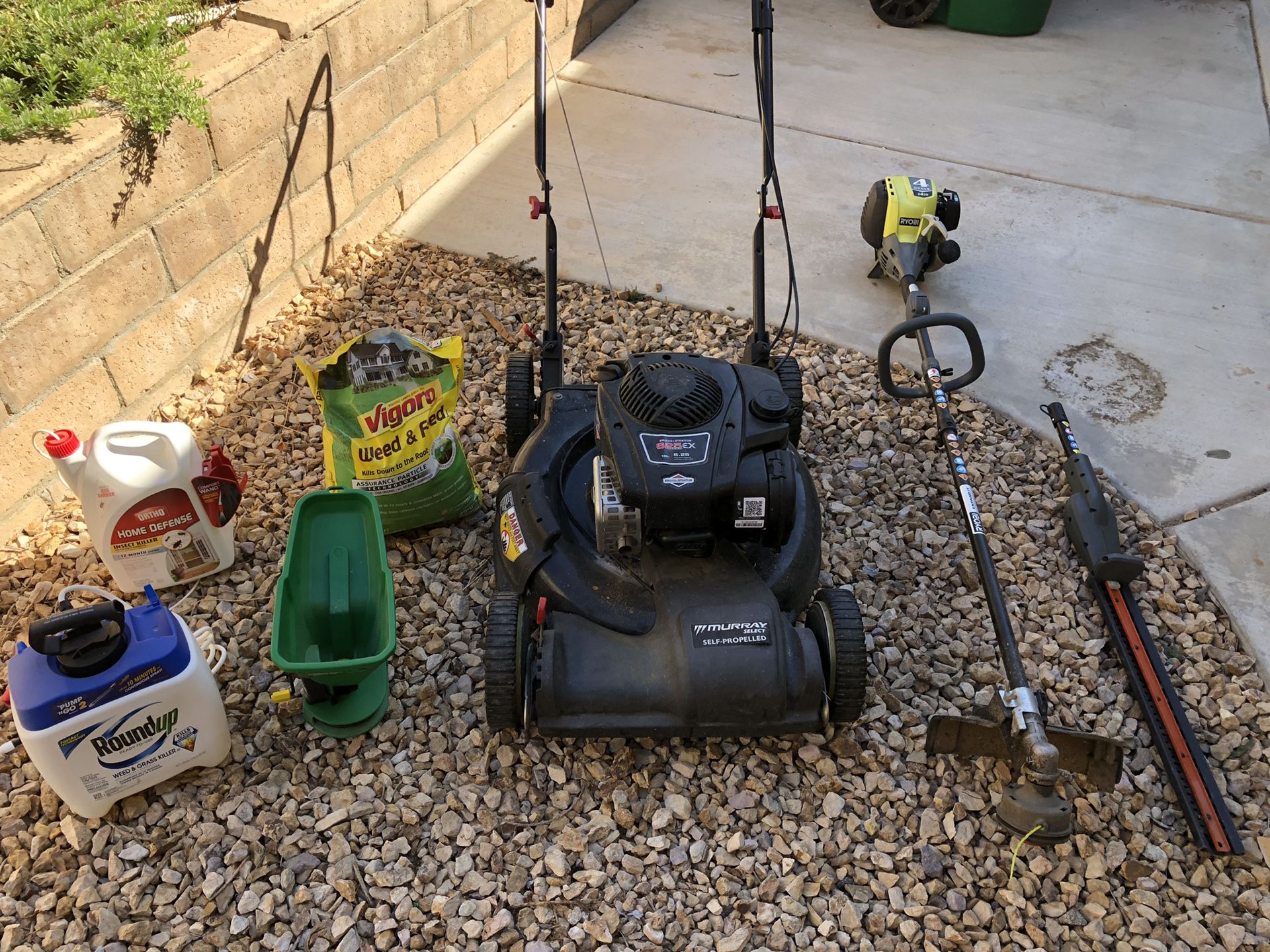Lawn care total package mower weed wacker and more