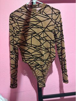 Women’s one piece long sleeve top