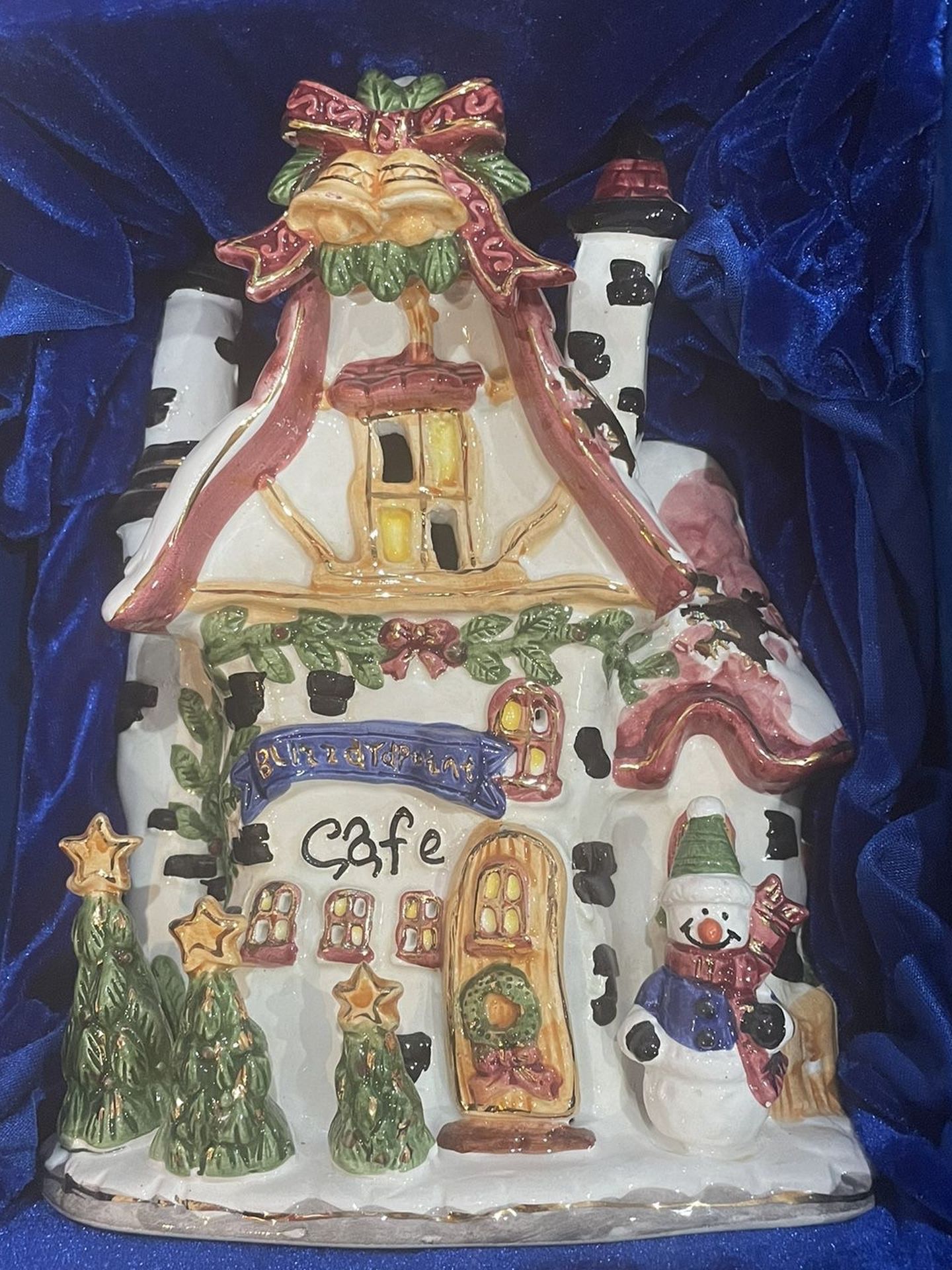 Set Of 6 Ceramic Candle Lit Village Pieces