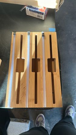 This natural bamboo 3-in-1 organizer holds and