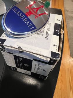 Maserati hood emblem
