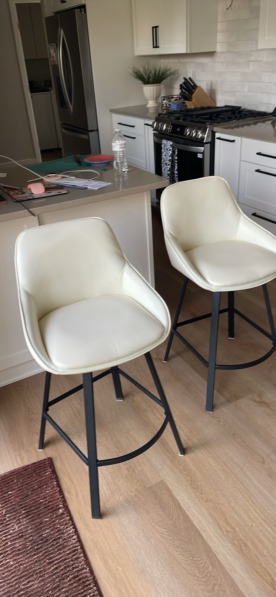 Two Like New Beige Bar Height Swivel Chairs