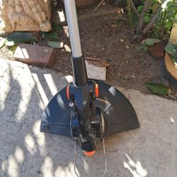 Remington 48" Long Electric Weed Eater. 