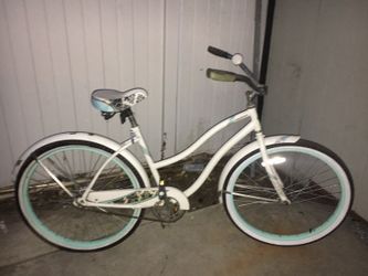teal and white beach cruiser