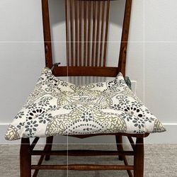 Antique oak chair with seat cushion