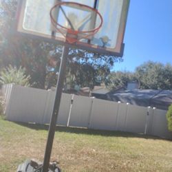 A Basketball Goal For Outside Use Still In Good Shape