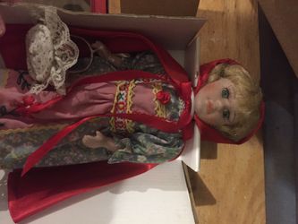 Porcelain doll little red riding hood