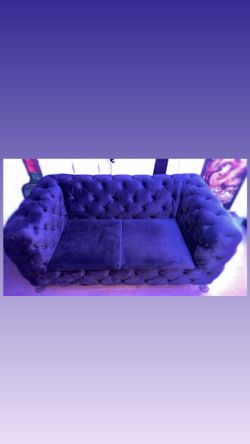 Two beautiful black velvet club couches