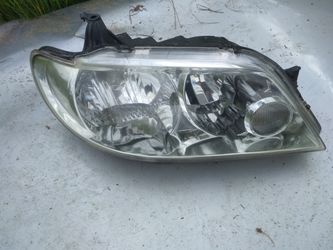 Mazda protege 5 2002 headlights