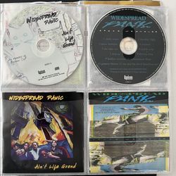 2 CDs Widespread Panic. Great collection of songs. Includes 2 CDs and album notes and art. No plastic gem boxes. In CD sleeve. I can mix and match any