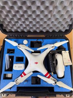 DJI phantom 2.  With Go Pro Hero 3+ gimbal setup.