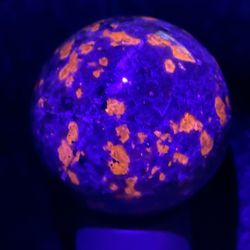 Gorgeous Yooperlite Sphere with UV Reactive Properties 