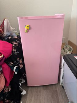Pink mini fridge