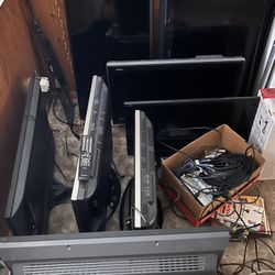 7 Flat Screen tvs & 3 dvd/vcr combos 