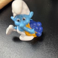Smurf Figure With Blueberries 