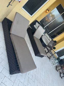 These 2 wicker lounge chairs