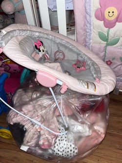 Baby jumper, bouncer ,clothes, bows and blankets