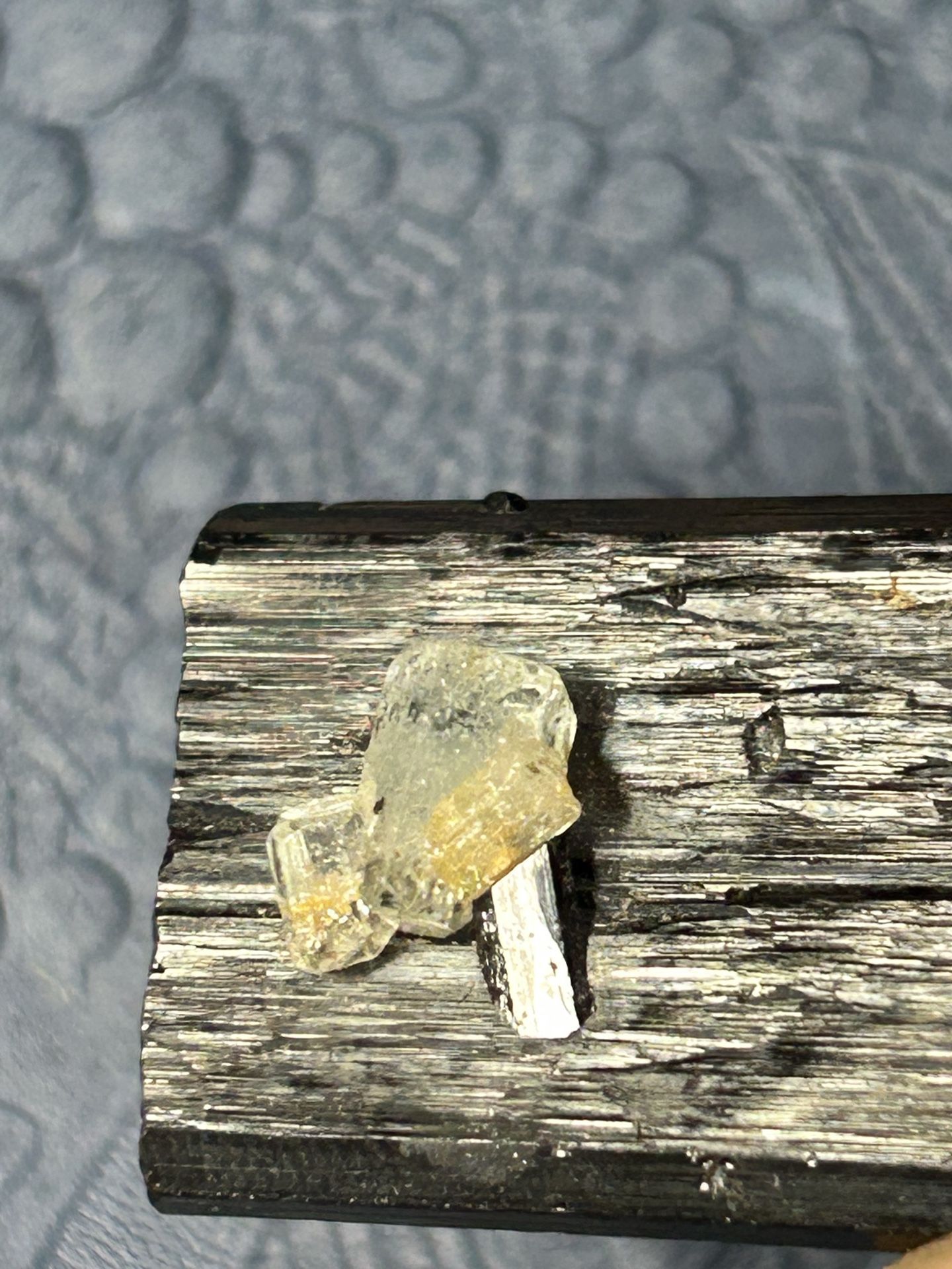 2 carat aquamarine gem on black tourmaline one inch water clear