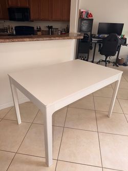 White Rectangular Dining Table