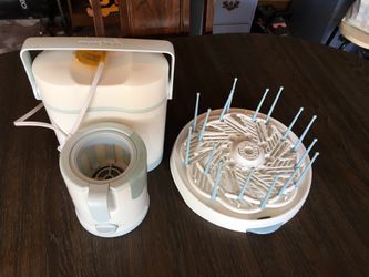 Munchkin bottle warmer and thermos