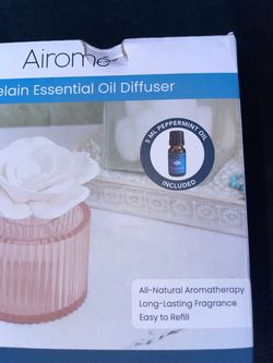 Brand new & Un-opened cute rose porcelain oil diffuser