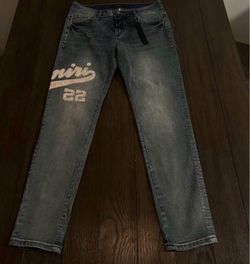 Amiri 22 Varsity Graphic Jeans