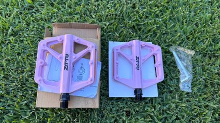 Pink bicycle pedals