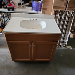30in Bath Vanity--tan W/ White Top 