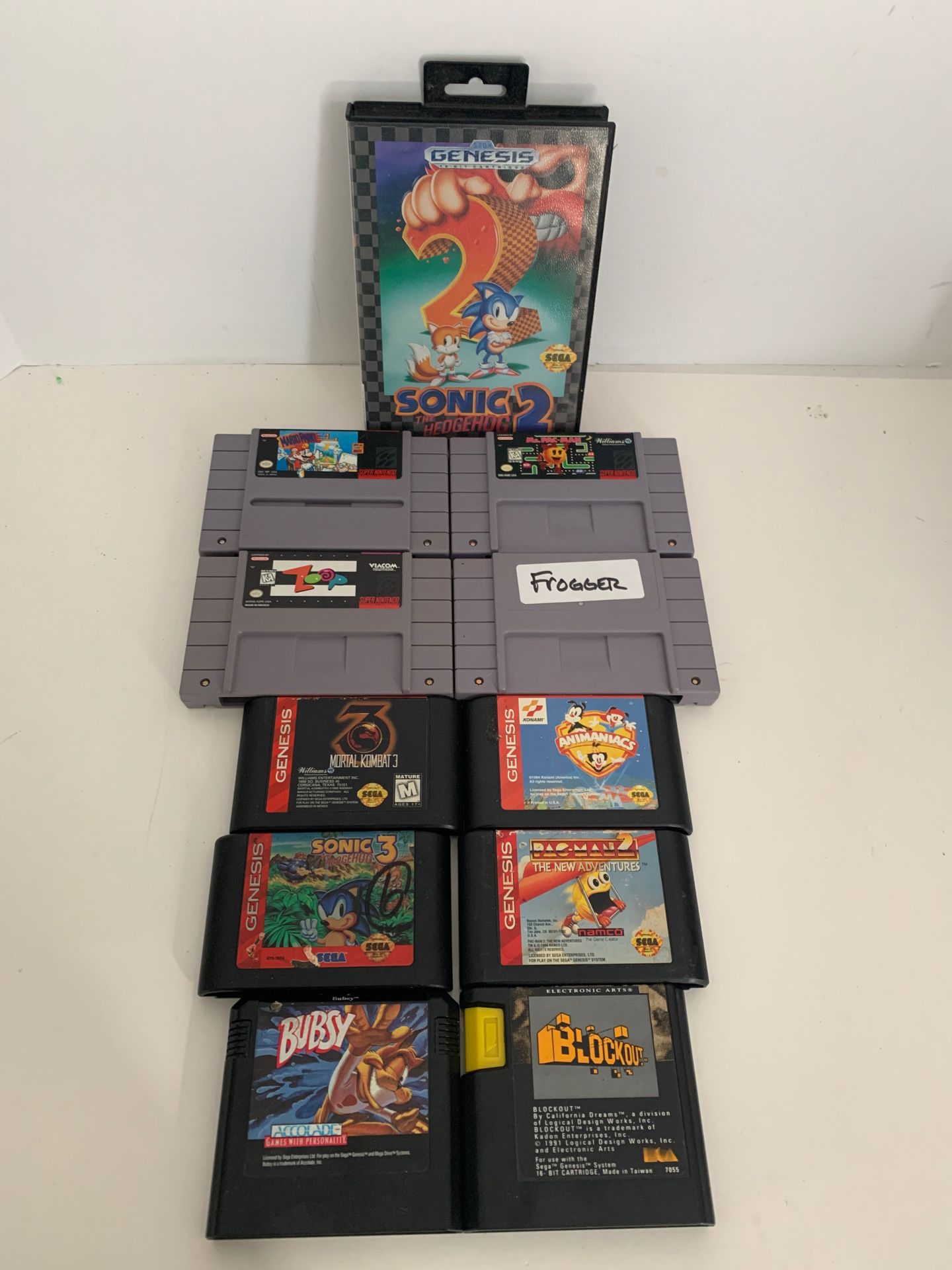 4 Super Nintendo games and 7 sega genesis