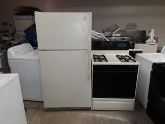 Almond Whirlpool refrigerator and almond Kenmore stove