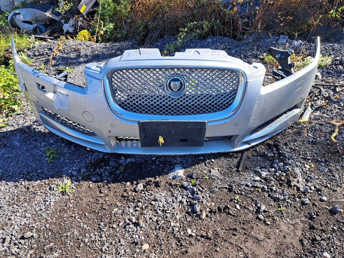 2009-2012 Jaguar XF Front Bumper Grey w Grille Emblem