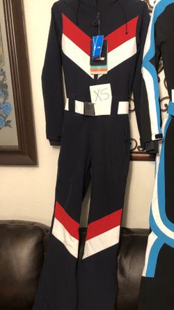 WOMEN’S NAVY   SLIM FITS WATERPROOF  SKI  SUIT. AND SPYDER SKI BIB. ASKING 100 EACH 