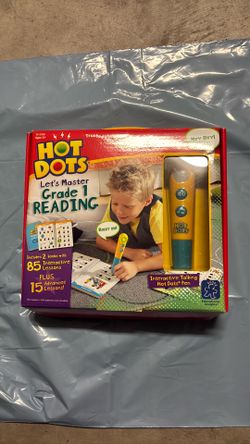 Hot Dots Let’s Master Grade1 Reading.