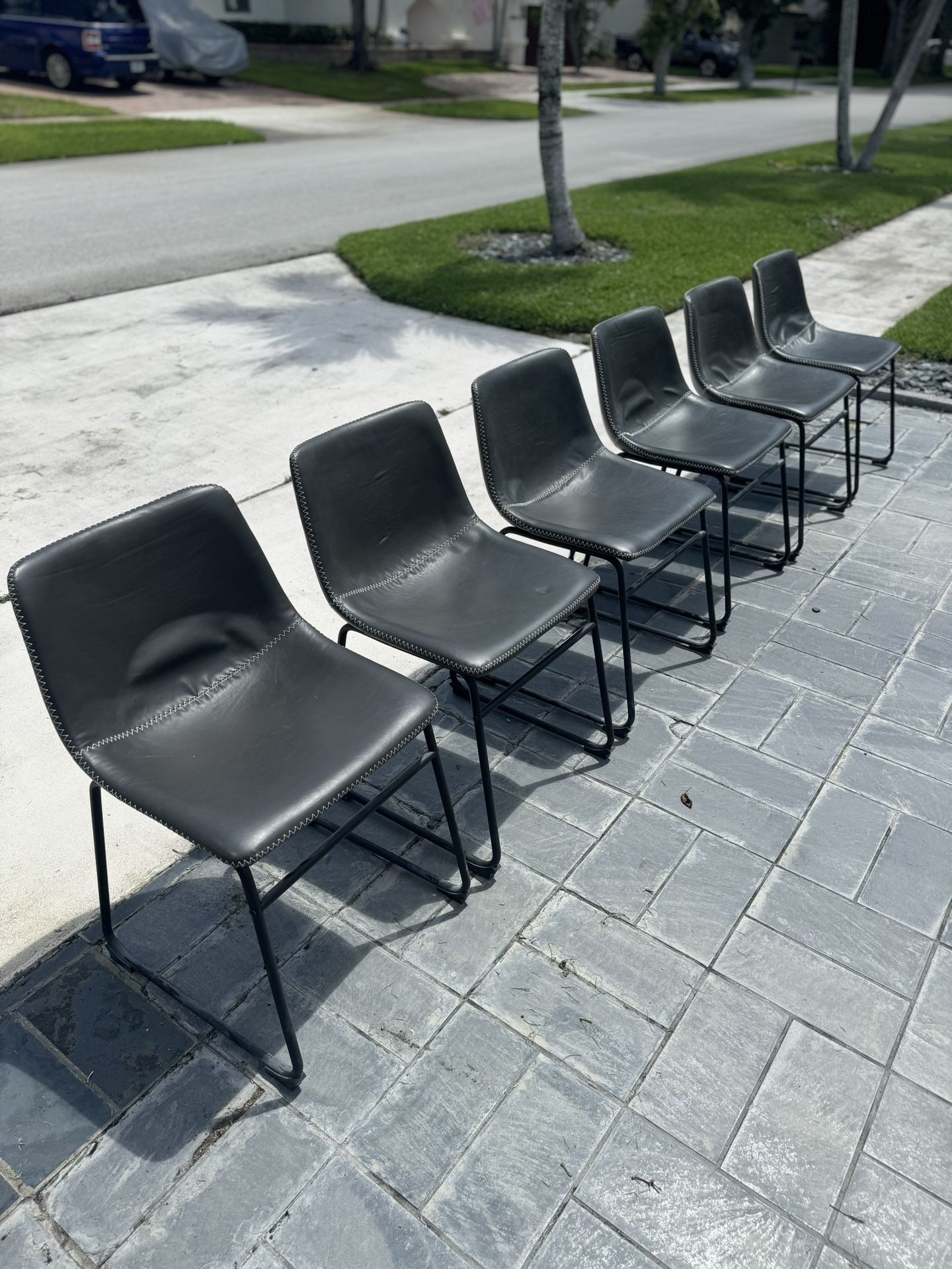 Lotusville Vintage Leather Chairs