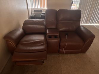 Recliner with power headrests