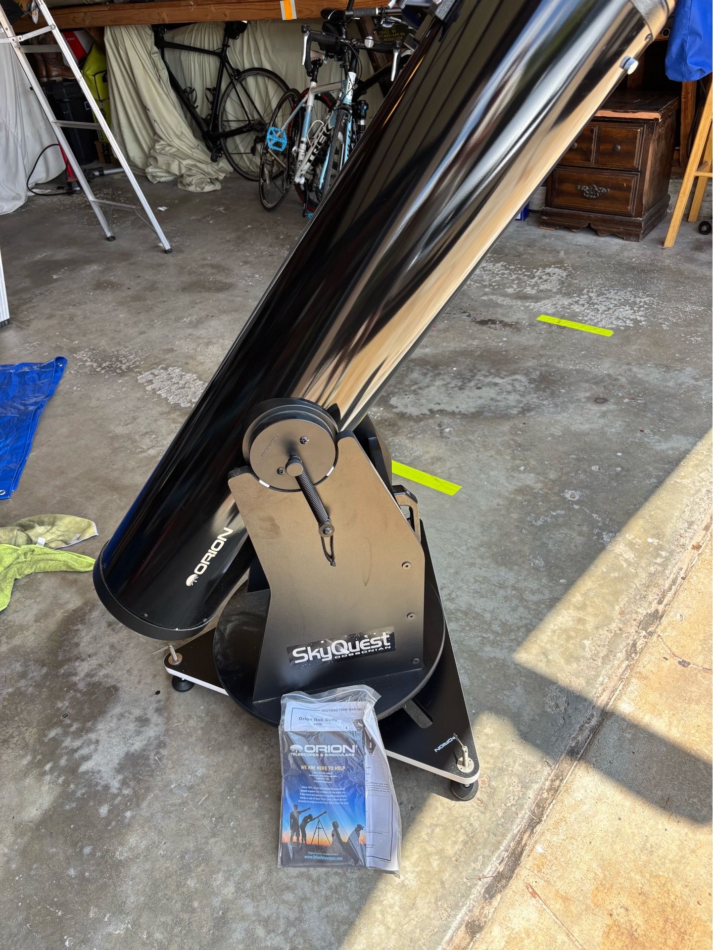 Orion Skyquest telescope with rolling stand and celestron filters.