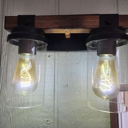 Wanna trade? Farm style bathroom light fixture.