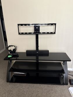 Tv Stand ( HEADPHONES AND SPEAKER NOT INCLUDED)