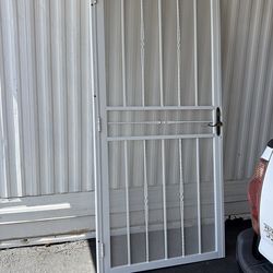 36 x 80 white steel security door very good condition. See all pictures 99 Avenue in Peoria thanks.