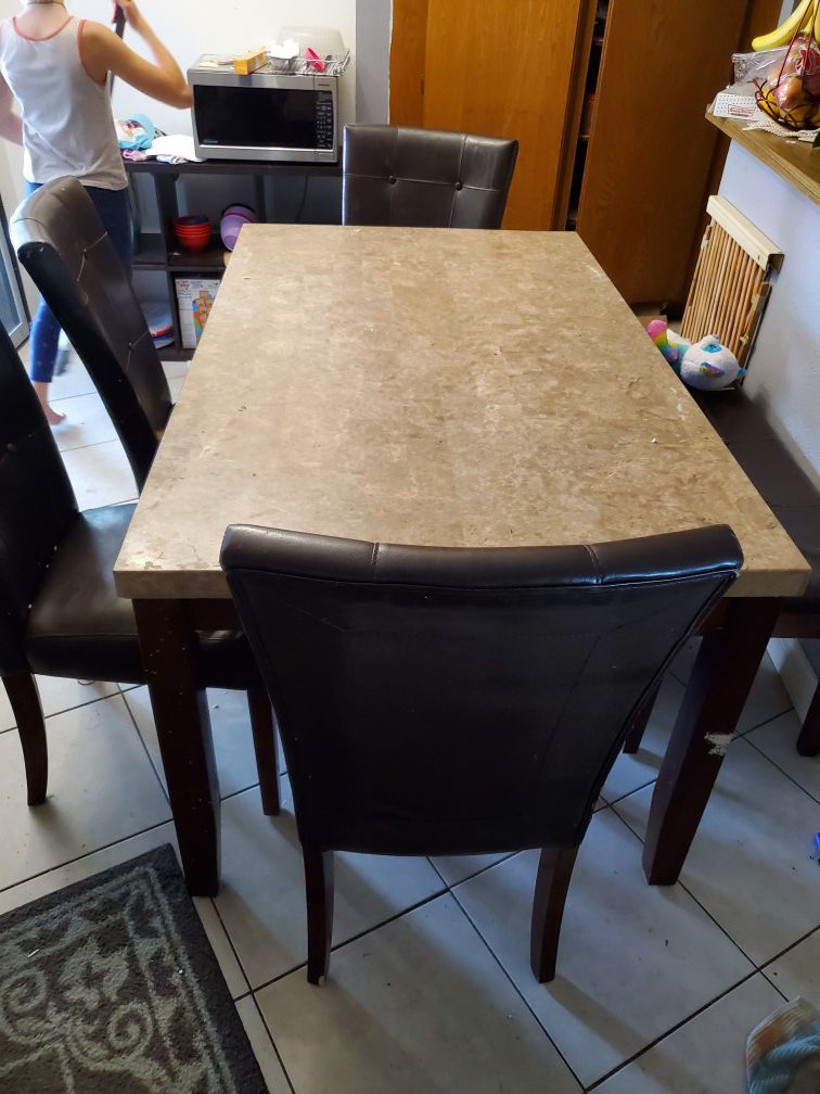 Dining room table. Granite! Chairs are not included!