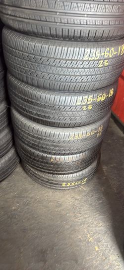 18” tires bridgestone 235/60/18 semi new with free installation $350